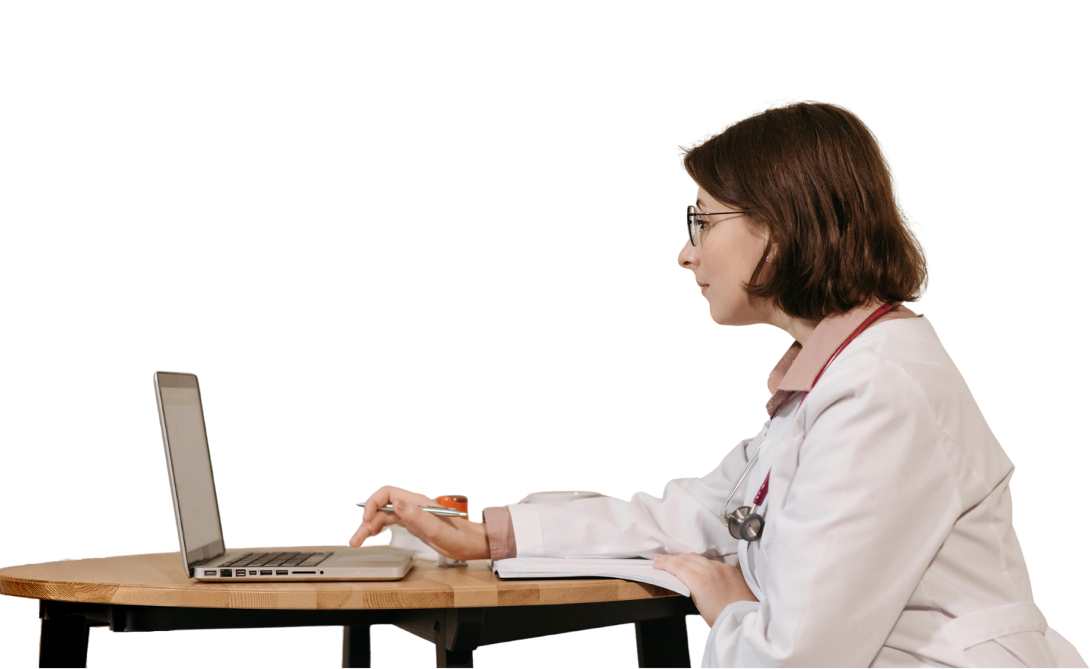 A staff member from a retirement home navigating through the Salyx dashboard on their desk.